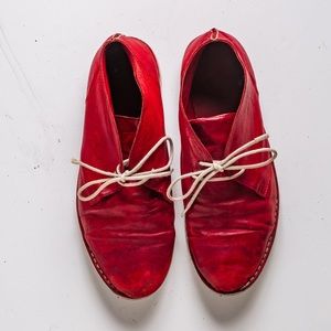 Lace up moccasin ankle boots.